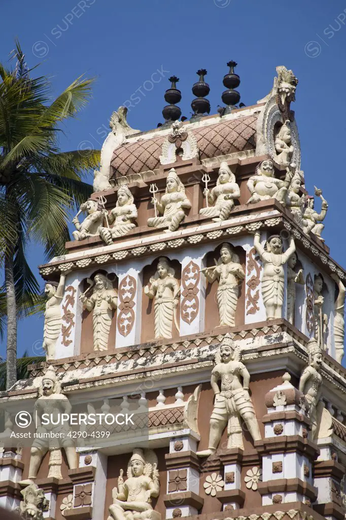 Carved figures on a gopuram, Ujaini Maha Kali Temple, Ambalathara, Kerala, India