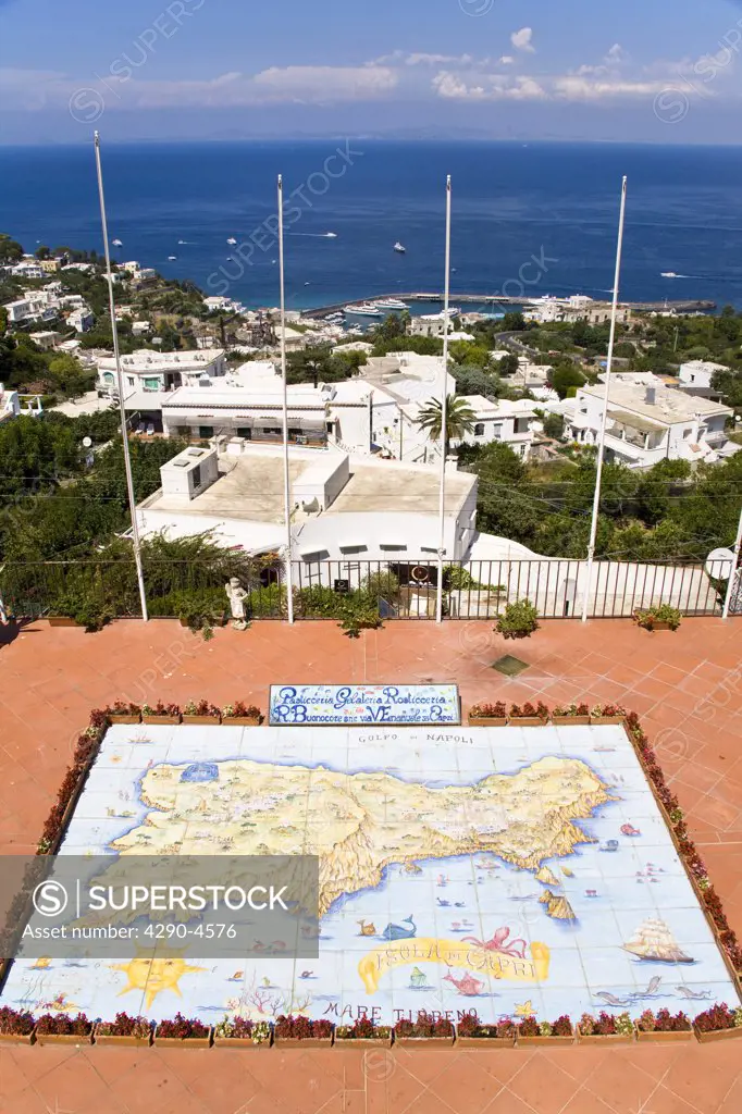 Map of Capri made from ceramic tiles, on a balcony, Marina Grande behind, Capri, Italy
