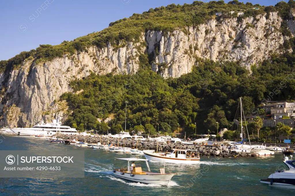 View of harbour, boats and mountains, Marina Grande, Capri, Italy