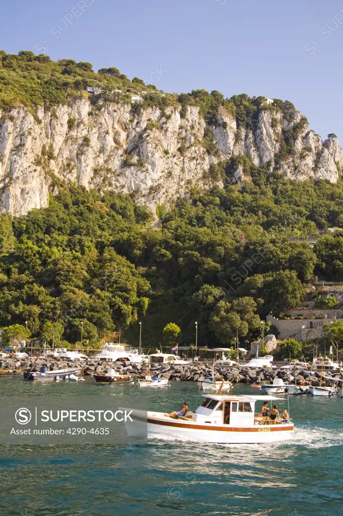 View of harbour, boats and mountains, Marina Grande, Capri, Italy