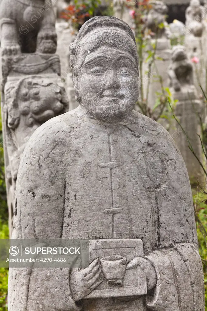 Carved statue of a man, Small Goose Pagoda Park, Xian, Shaanxi Province, China