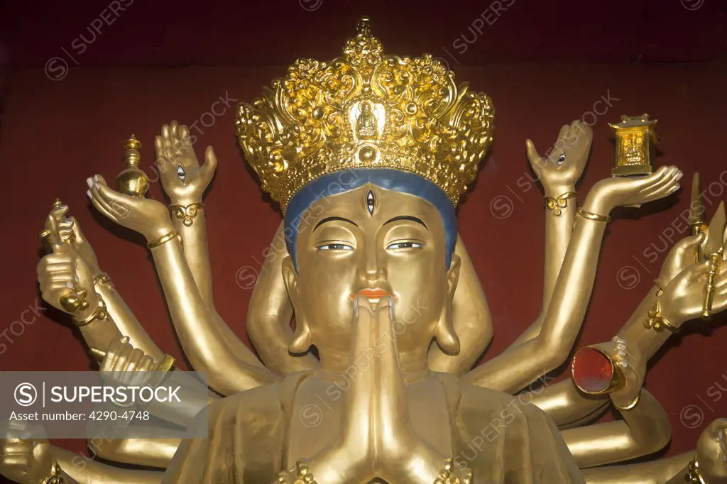 A golden Buddha, Wenshu Temple, Chengdu, Sichuan Province, China