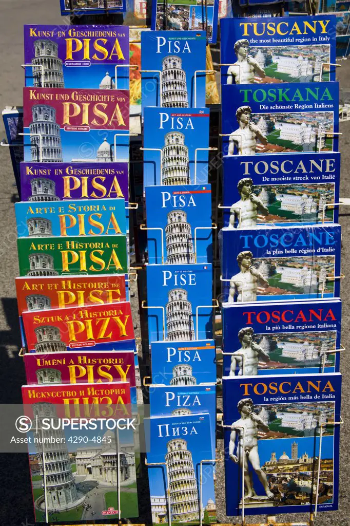 Pisa guidebooks on display outside a shop, Pisa, Tuscany, Italy