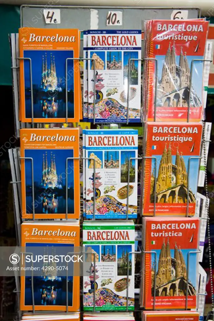 Barcelona guide books on display outside a shop, La Rambla, Barcelona, Spain