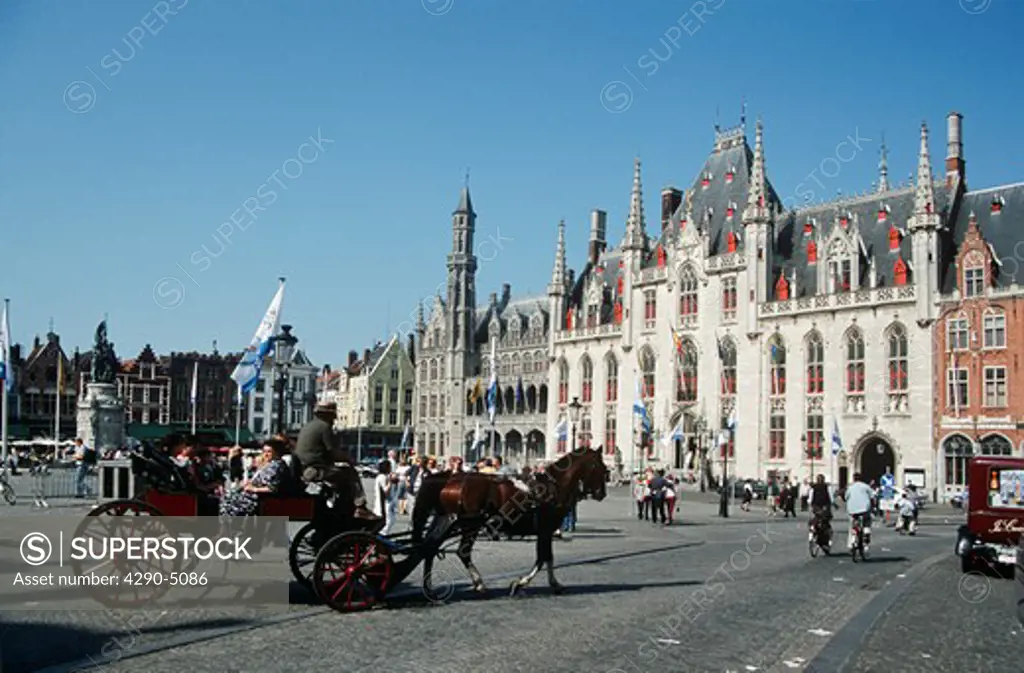 Horse and carriage and buildings in the Markt, Market Place, Bruges, Belgium