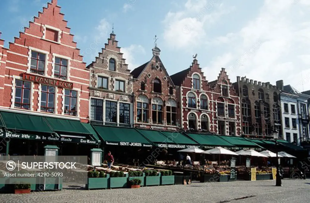 Early morning, restaurants and buildings in the Markt, Market Place, Bruges, Belgium