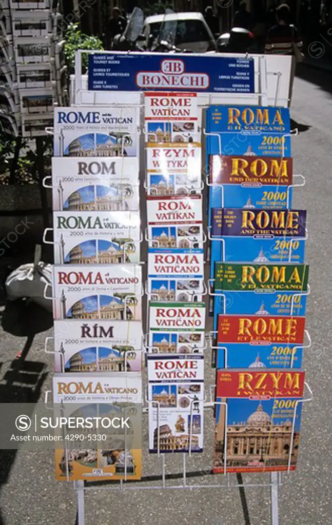 Rome guide books on display outside a shop, Rome, Italy