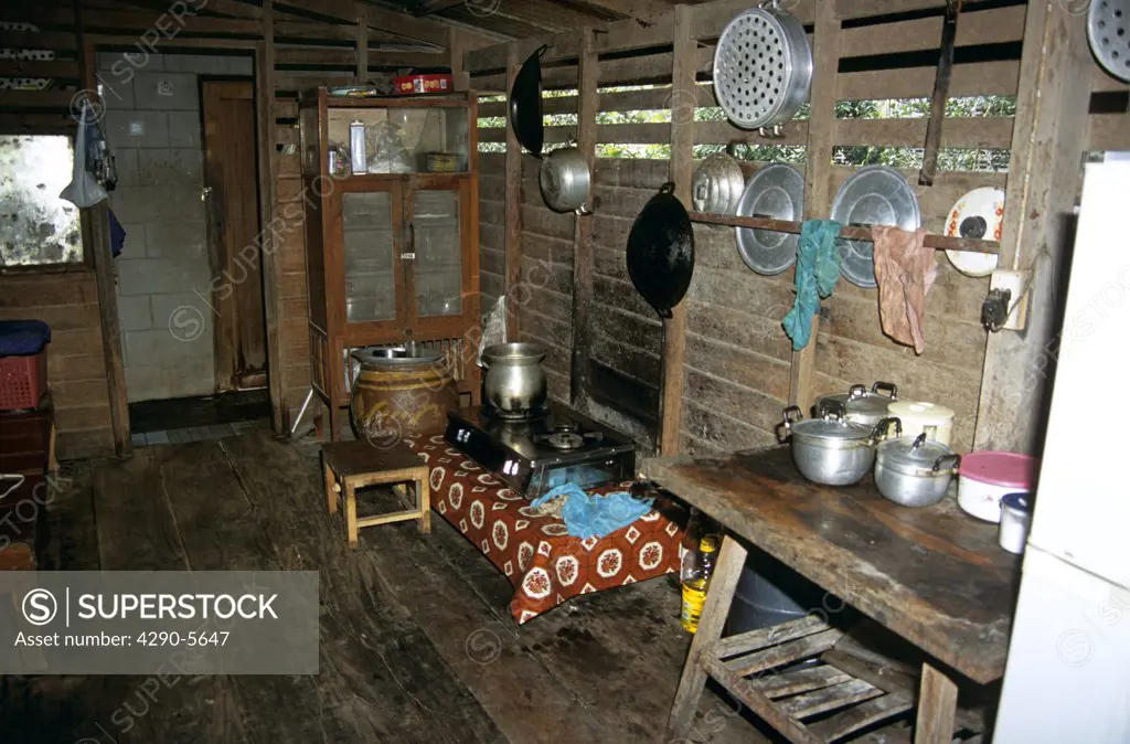 Kitchen in traditional style Thai house of wooden construction, near Bangkok, Thailand