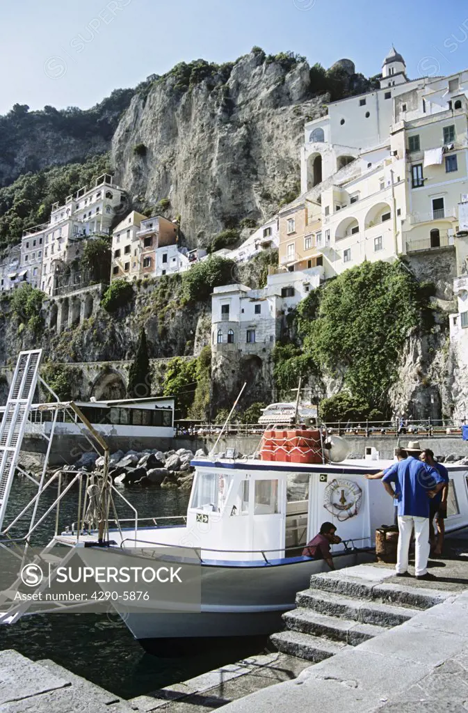 Boat moored at quayside, Amalfi, Amalfi Coast, Campania, Italy