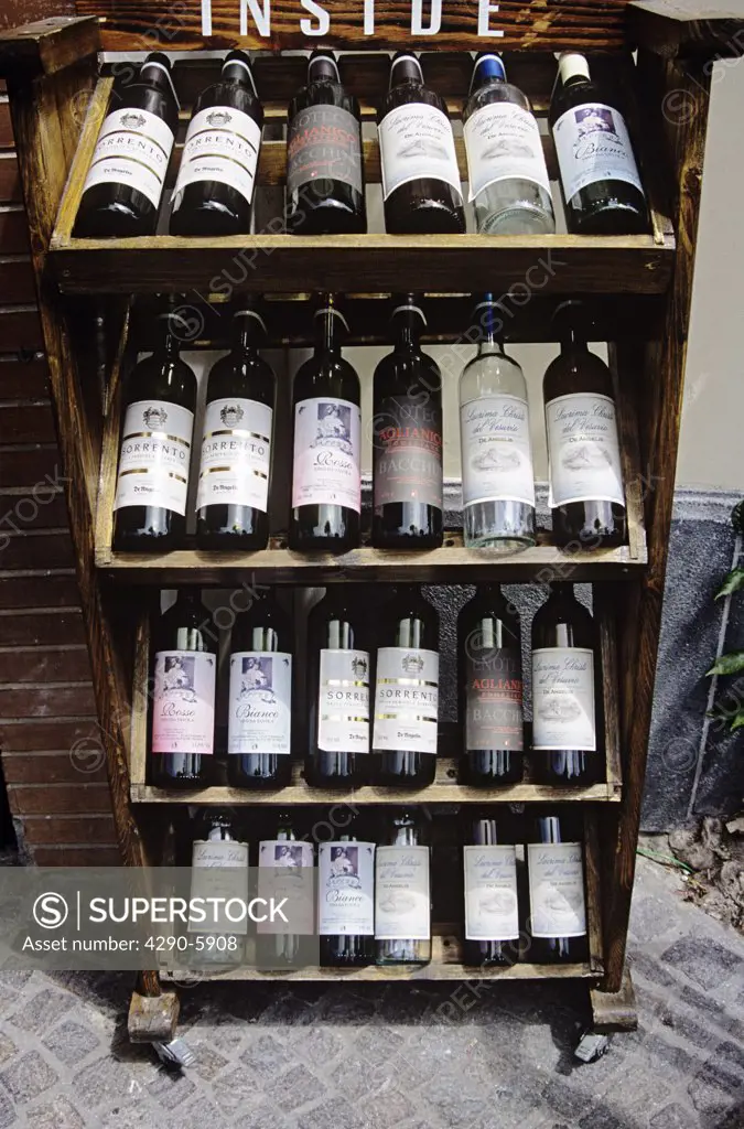 Bottles of wine on display outside a wine shop, Sorrento, Italy