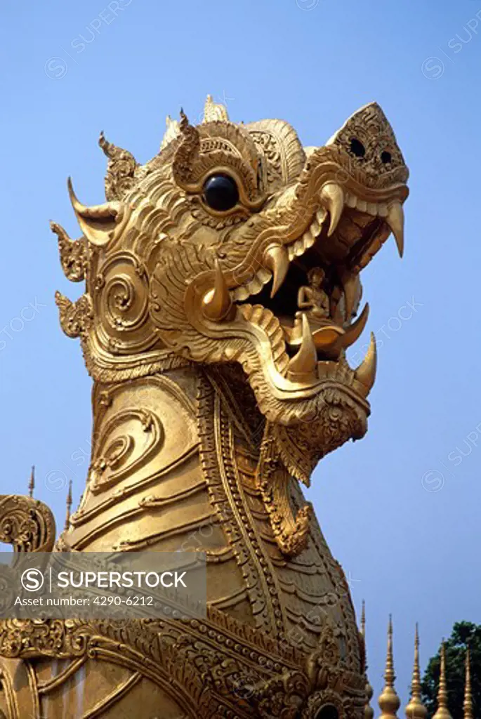 Ornate golden statue, Wat Phra That Suton Mong Konkiree Temple, Denchai District, Phrae Province, Thailand