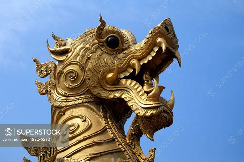 Ornate golden statue, Wat Phra That Suton Mong Konkiree Temple, Denchai District, Phrae Province, Thailand