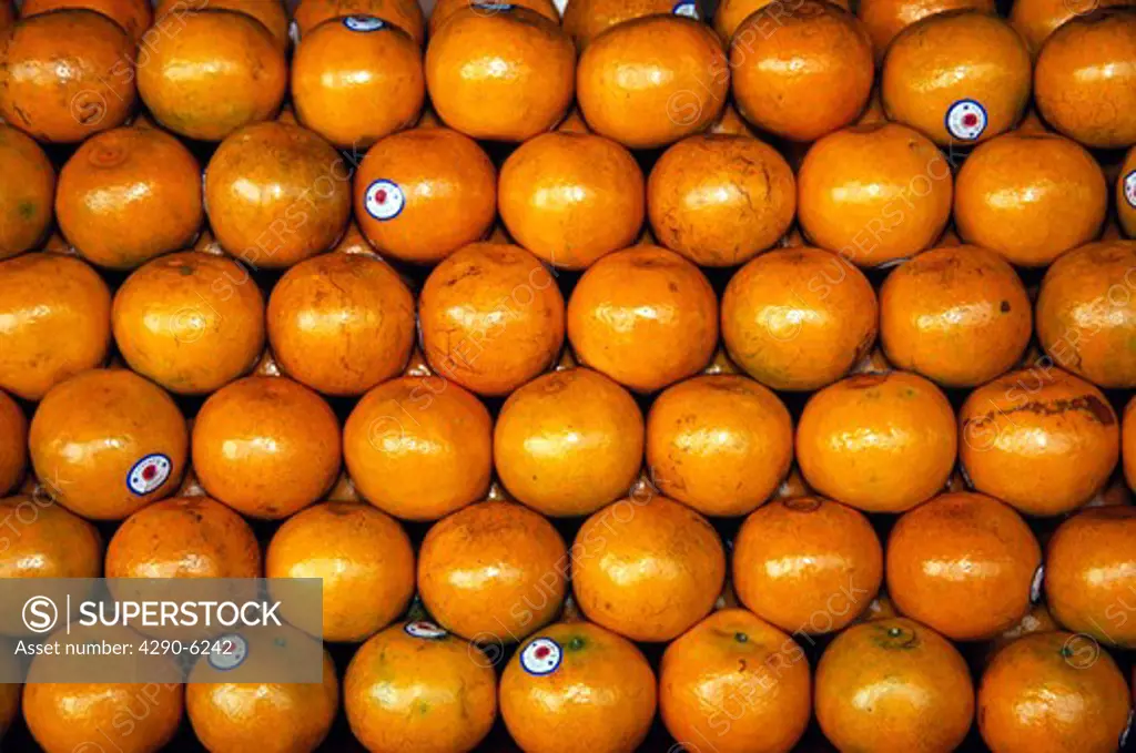 Oranges for sale in a shop, Thailand