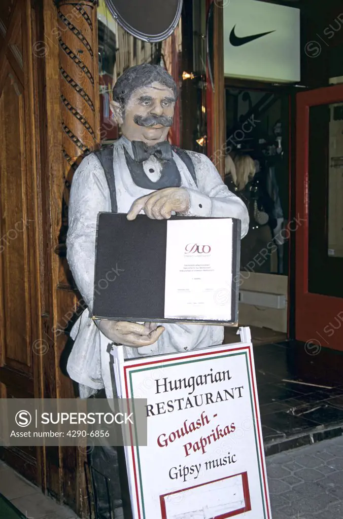 Model of waiter holding menu, Budapest, Hungary
