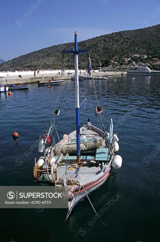 Old fishing boat moored in harbour, Agia Efimia, Kefalonia, Greece