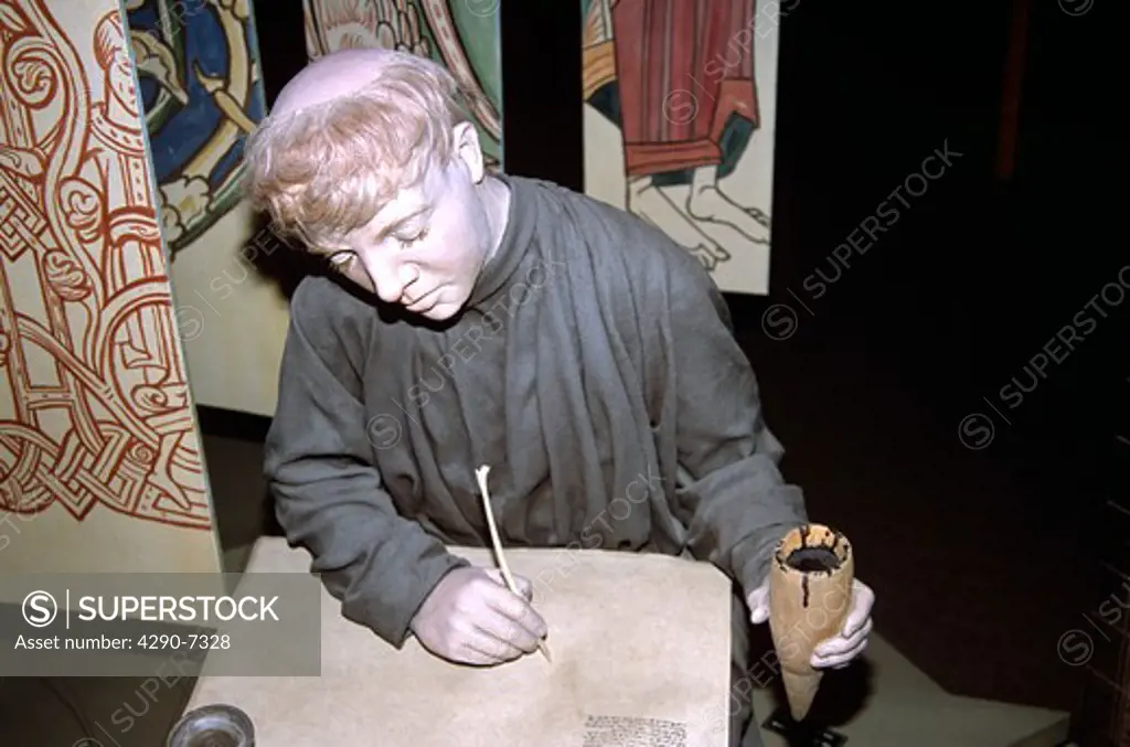 Bayeux Tapestry Museum, Model of a monk at work in a scriptorium, Bayeux, Normandy, France