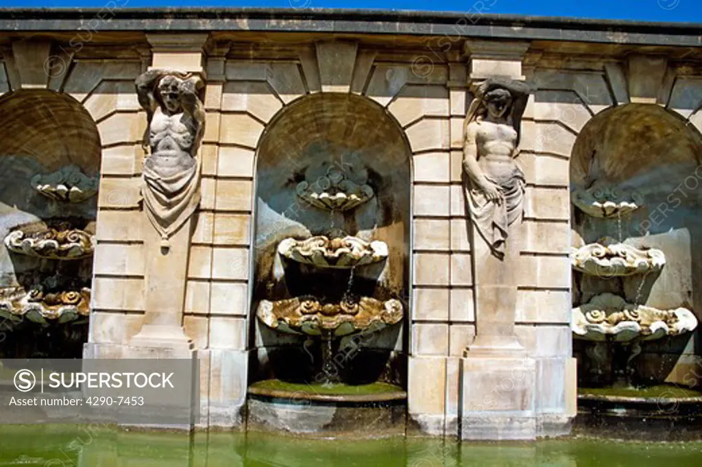 Blenheim Palace, Woodstock, near Oxford, Oxfordshire, England. Three water fountains in wall in lower water terrace.