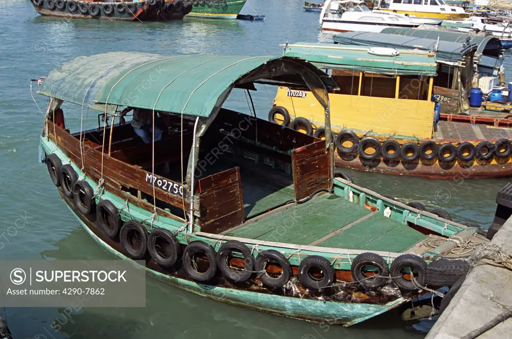 Green and yellow sampans in harbour, Cheung Chau Island, Hong Kong, China