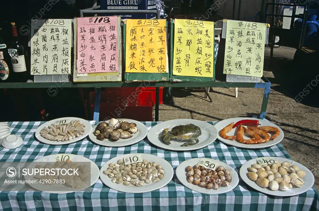 Display of shellfish on plates outside restaurant, Cheung Chau Island, Hong Kong, China