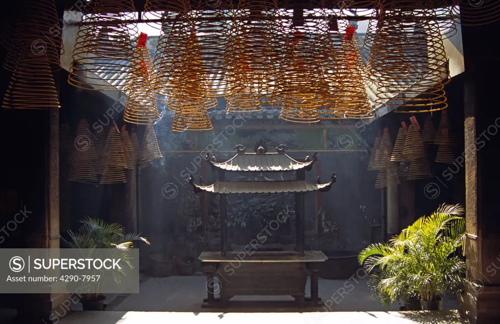 Shrine and burning incense coils, Kun Iam Temple, Macau, China