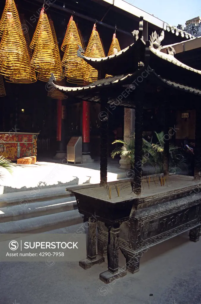 Shrine and burning incense coils, Kun Iam Temple, Macau, China