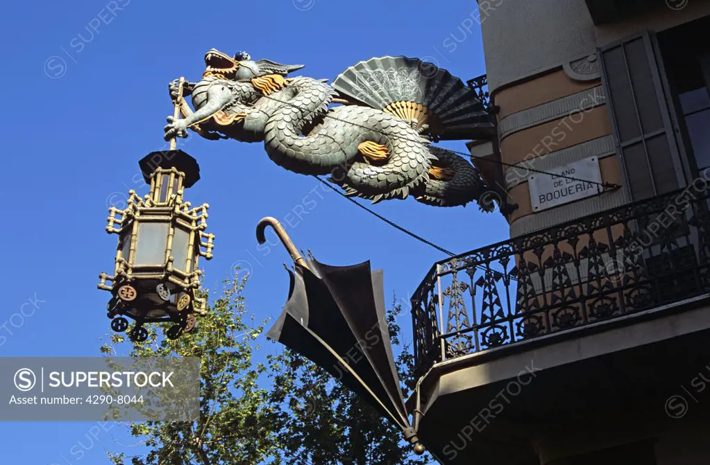Dragon lamp, umbrella and balcony, Casa Bruno Quadras, La Rambla, Barcelona, Spain