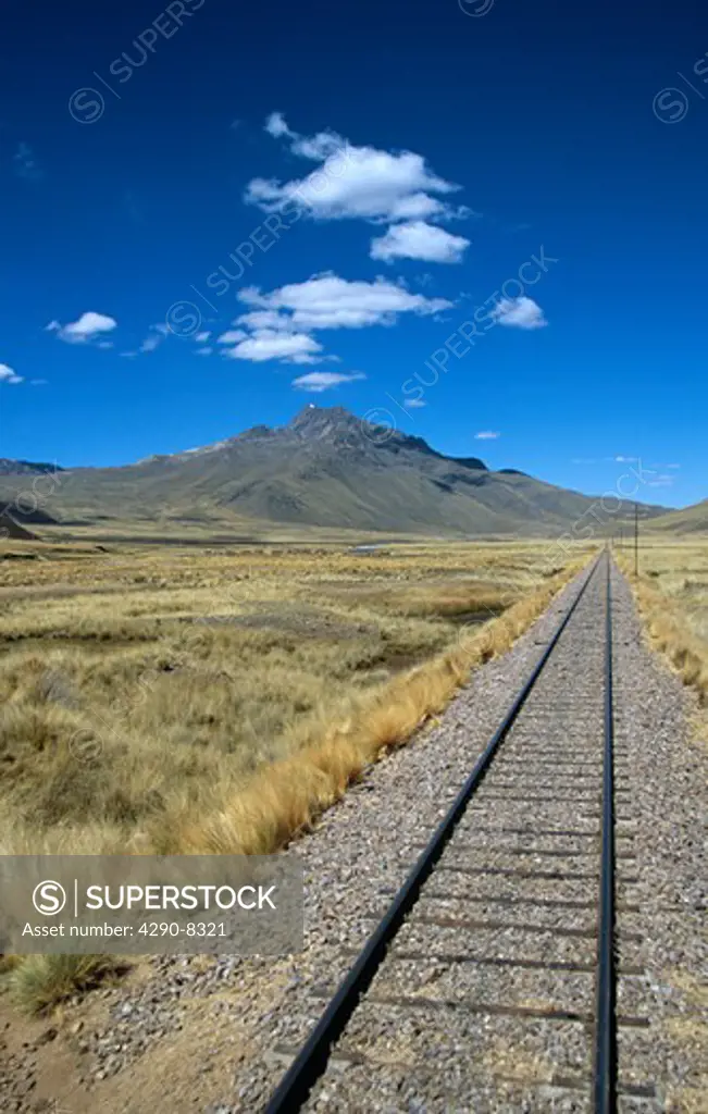Railway track through the Andes mountain range, Puno to Cusco Perurail train journey, Peru