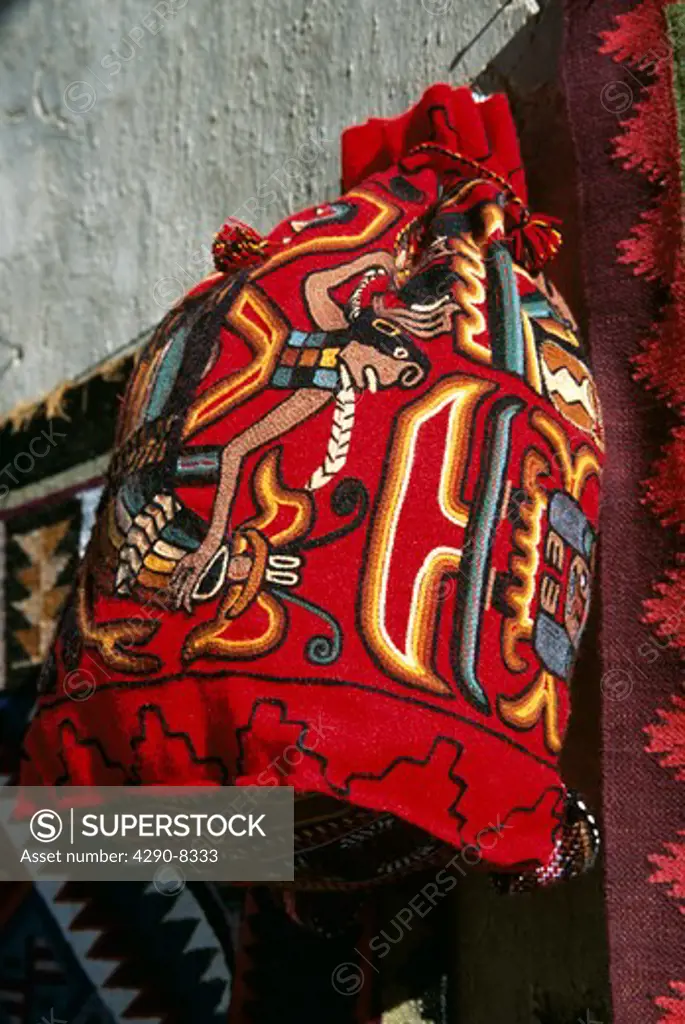 Colourful patterned embroidered bag in the market, Ollantaytambo, Sacred Valley of the Incas, near Cusco, Peru