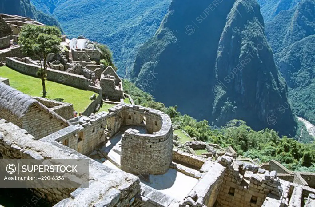Looking down onto the Sun Temple and Inca ruins, at base of Huayna Picchu, Machu Picchu, Peru