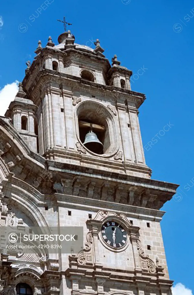 Ornate bell and clock tower, Iglesia La Compania de Jesus, Plaza de Armas, Cusco, Peru