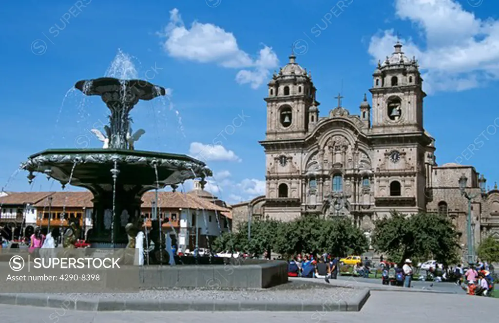 Iglesia La Compania de Jesus, and ornate fountain, Plaza de Armas, Cusco, Peru