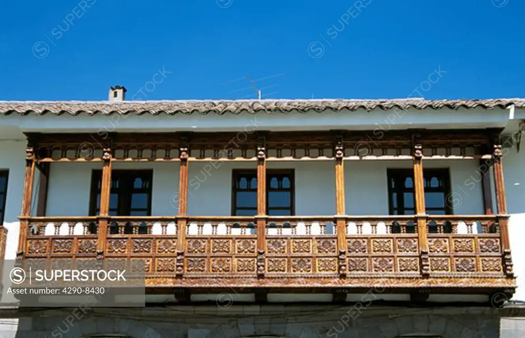 Typical carved wooden balcony in Plaza de Armas, Cusco, Peru
