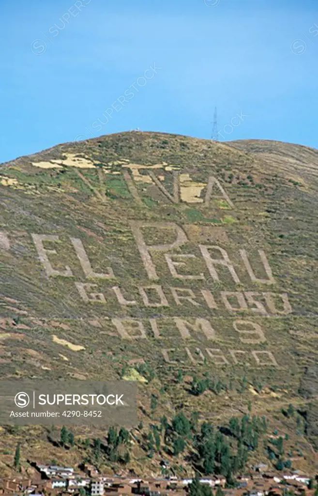 Looking across to Viva el Peru written on the hillside, Cusco, Peru