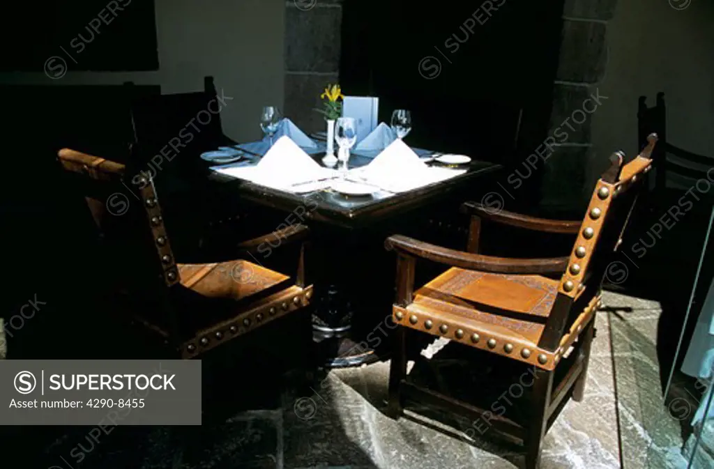 Table and chairs in restaurant, Cusco, Peru