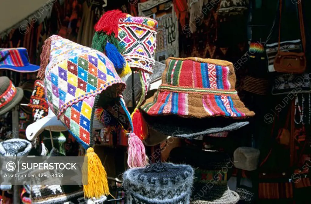 Colourful hats on display for sale in Mercado del Quiswarcancha, Cusco, Peru