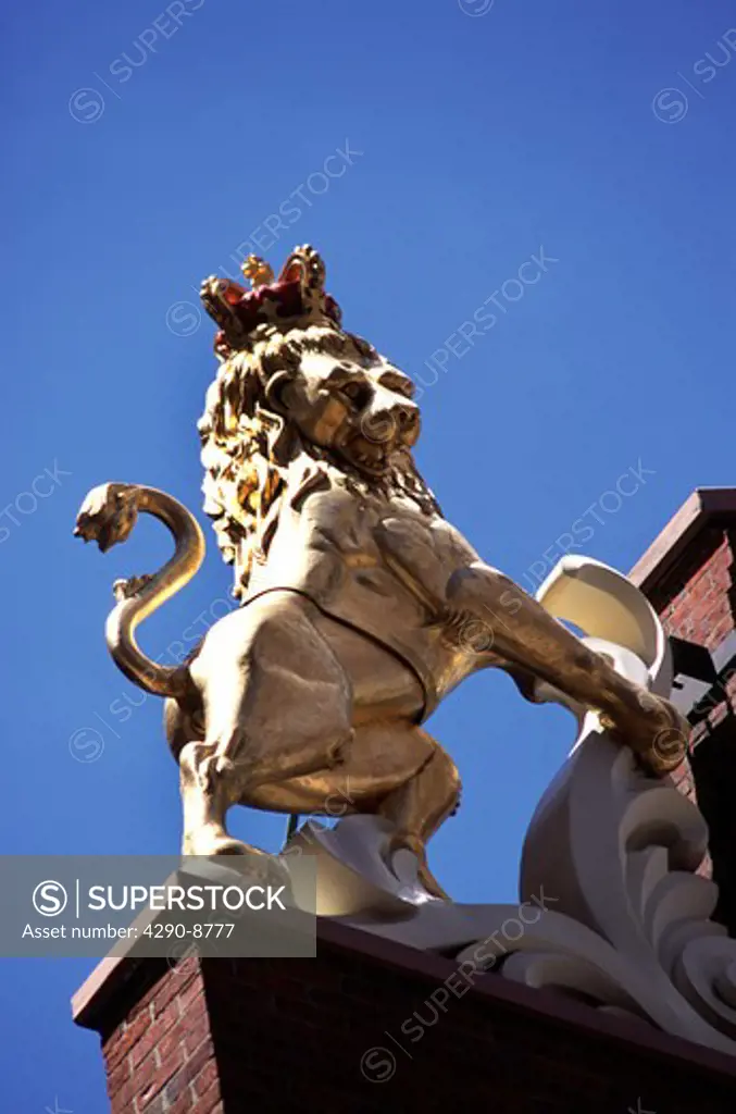 Statue of lion on Old State House, Boston, Massachusetts, New England, USA. Oldest public building in Boston
