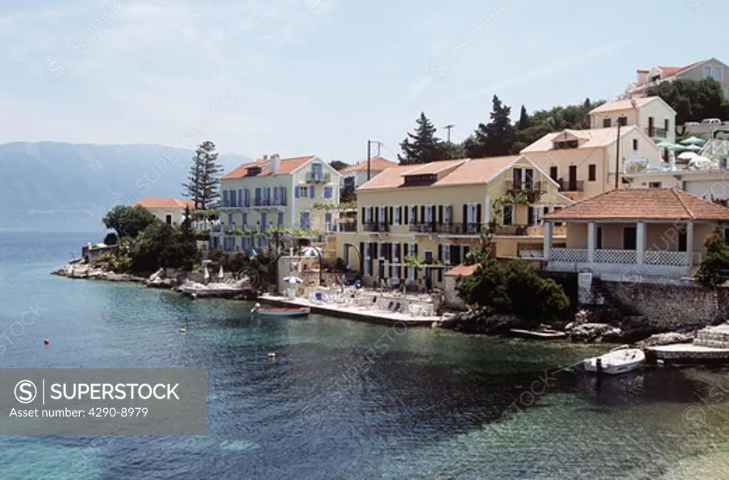 Buildings beside the sea, and natural harbour, Fiskardo, Kefalonia, Greece