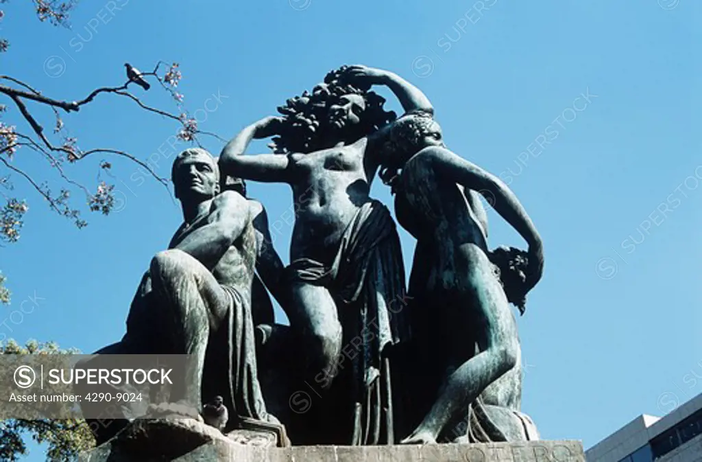 Statue of a man and women, Placa de Catalunya, Barcelona, Spain