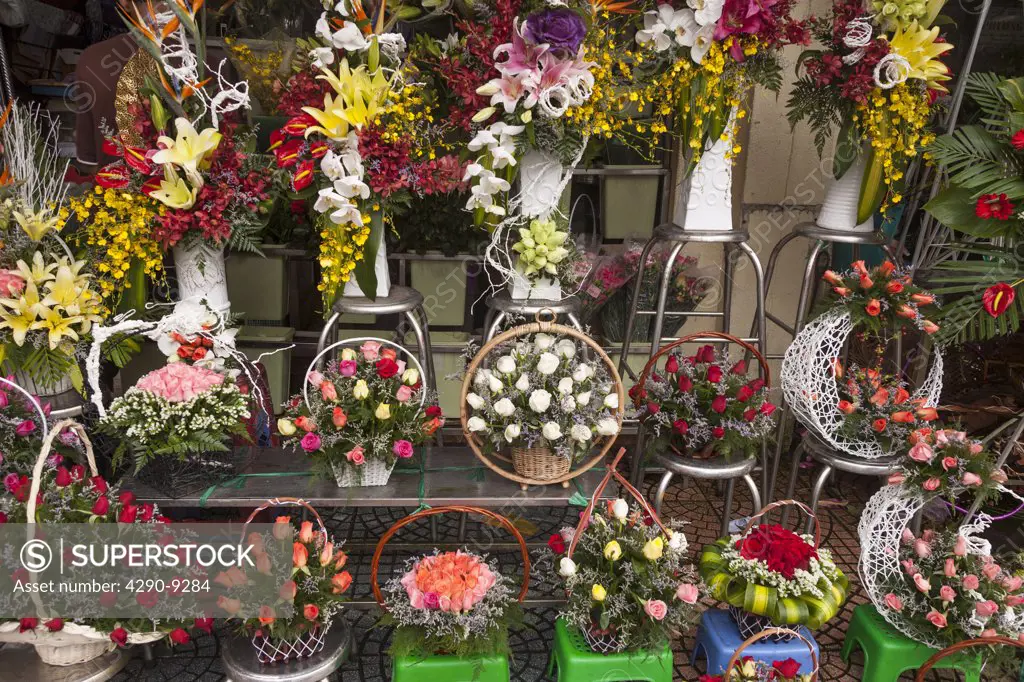 Vietnam, (Saigon), Ho Chi Minh City, Colorful bouquets of flowers for sale outside Ben Thanh Market