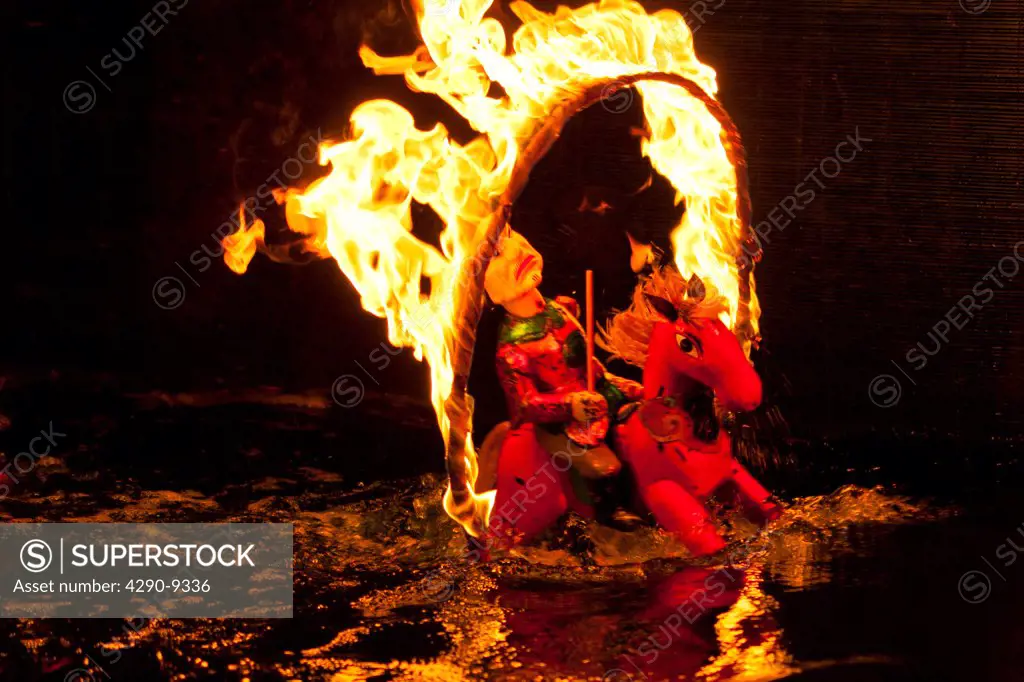 Vietnam, Hanoi, Thang Long Water Puppet Theatre, Water puppet, man on horseback riding through flames