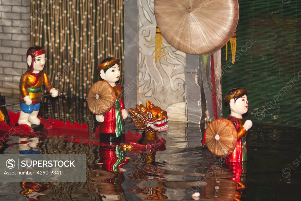 Vietnam, Hanoi, Thang Long Water Puppet Theatre, Water puppets riding in a dragon boat