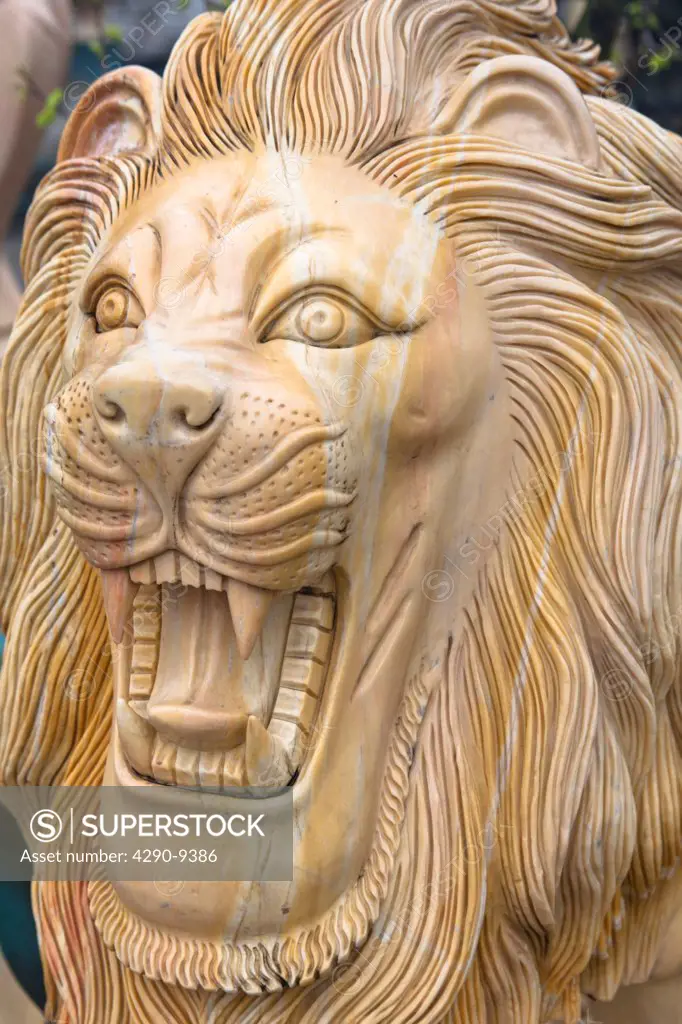 Vietnam, Hai Duong, Stone carving of growling male lion,