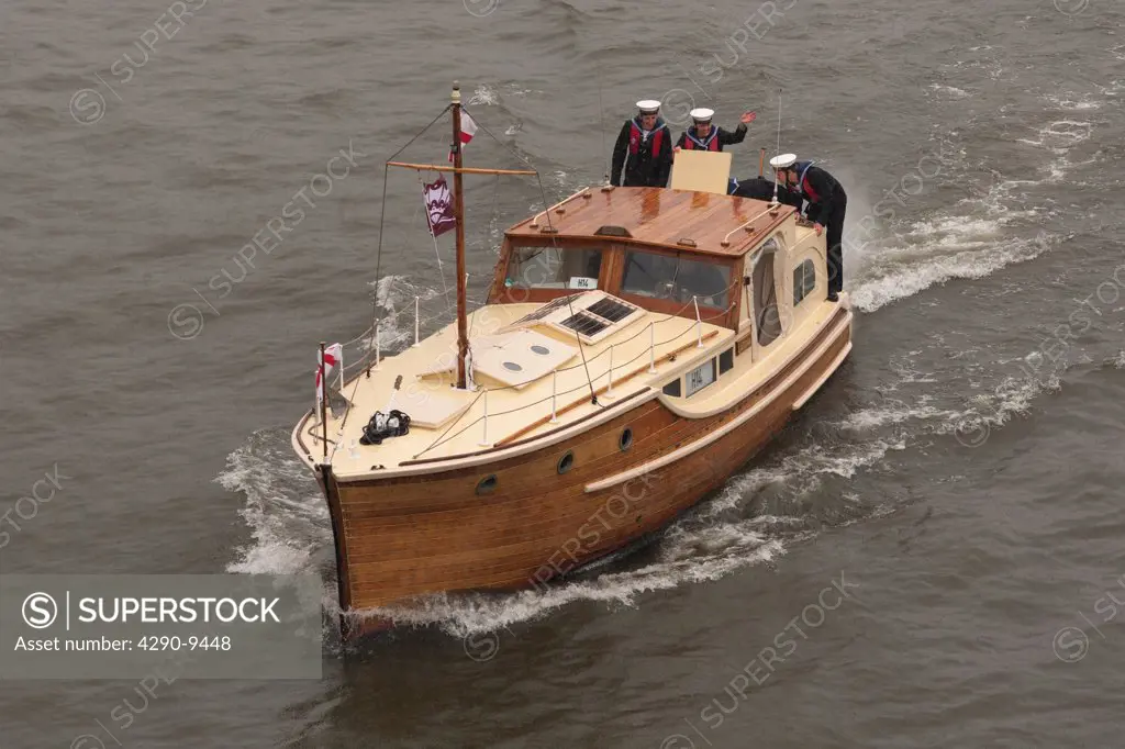 UK, England, London, Latona, Dunkirk little ship proceeds along River Thames, as part of Queen's Thames Diamond Jubilee Pageant