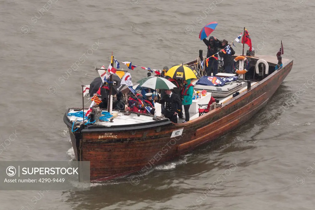 UK, England, London, New Britannic, Dunkirk little ship proceeds along River Thames, as part of Queen's Thames Diamond Jubilee Pageant
