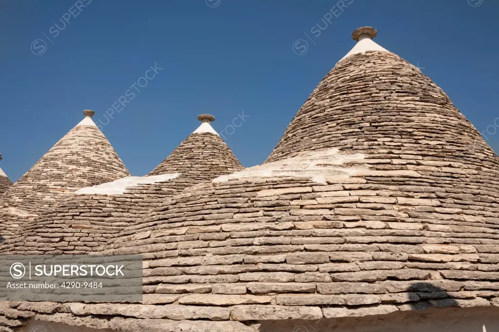Conical dry stone rooves of trulli houses, Rione Monti, Alberobello, province of Bari, in the Puglia region, Italy