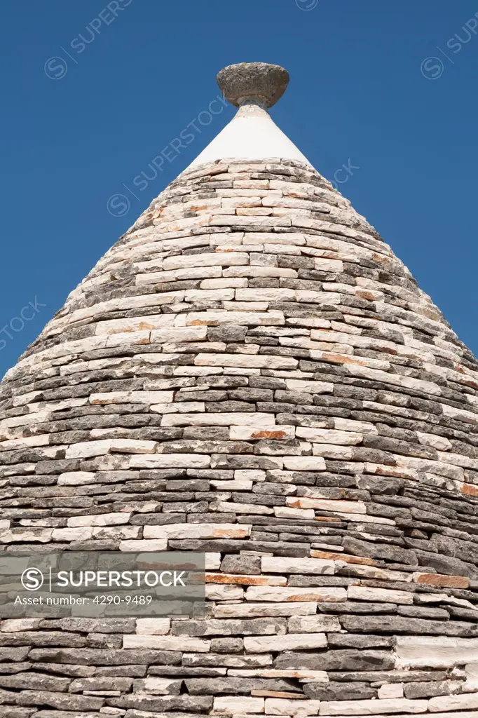 Conical dry stone roof of a trulli house, Rione Monti, Alberobello, province of Bari, in the Puglia region, Italy