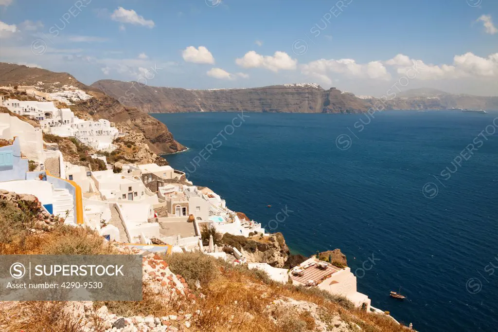 Overlooking the clifftop town of Oia, on the Greek island of Santorini, Greece