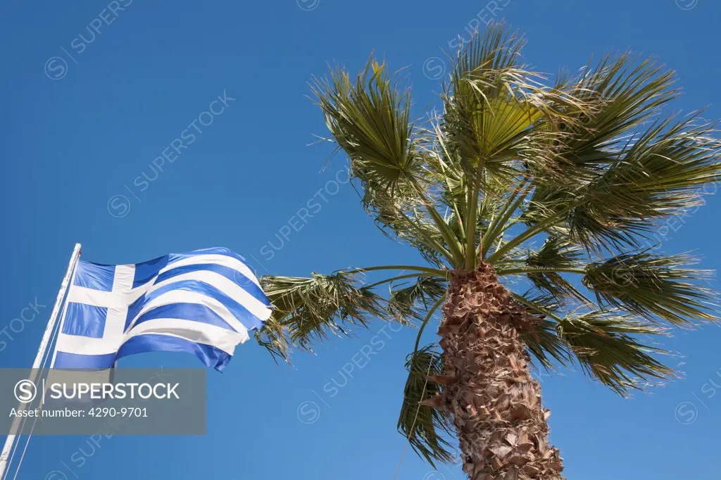 Greek flag and palm tree, Katakolon, Greece