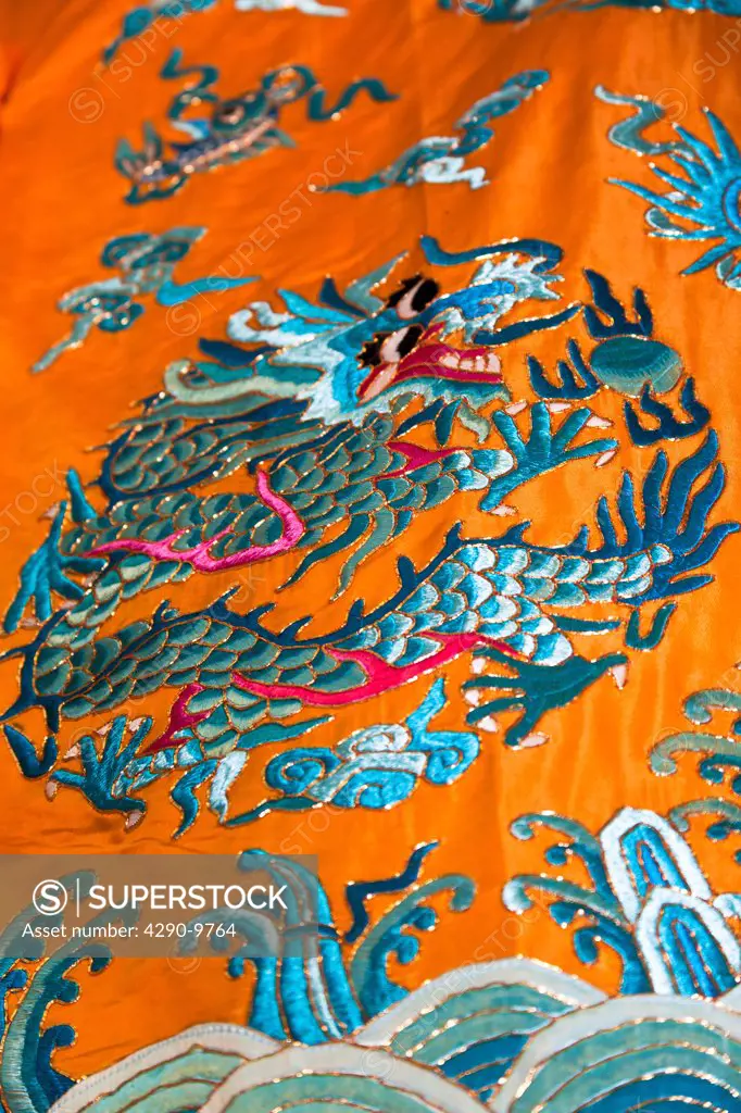 Colourful orange and blue Chinese embroidered silk garment for sale, China