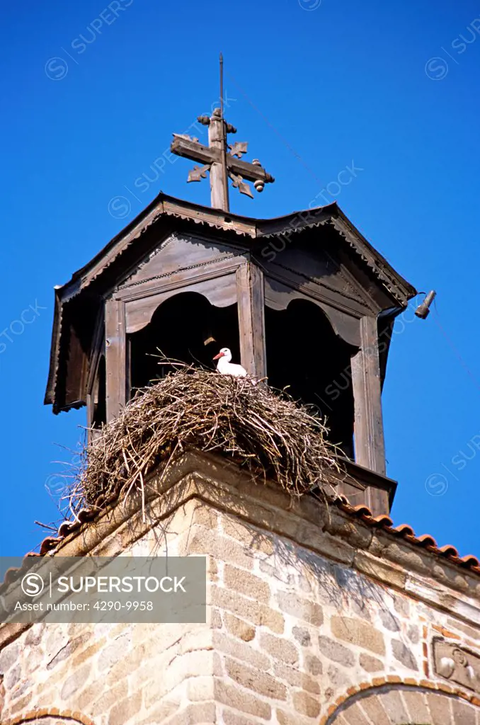 Stork on nest, Holy Trinity Church, Sveta Troitsa Church, clock and bell tower Bansko Bulgaria